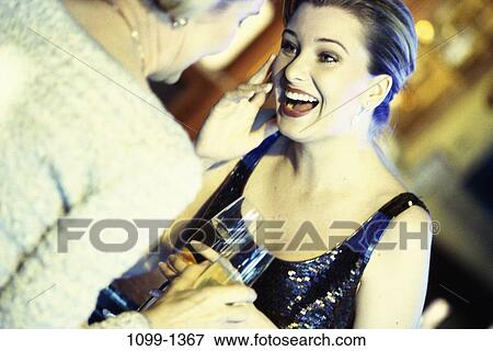 women, people, glasses, talking, conversation, champagne View Large Photo Image Stock Photo - women, people, glasses, talking, conversation, champagne. Fotosearch