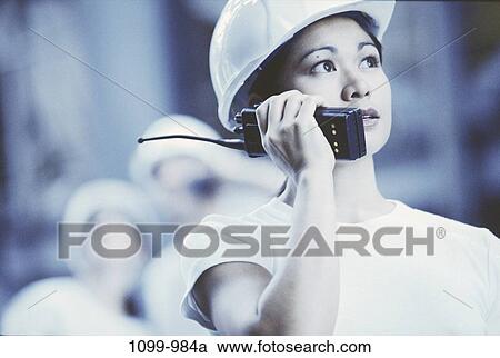 women, people, industry, construction, woman, talking, Asian View Large Photo Image Stock Image - women, people, industry, construction, woman, talking, Asian. Fotosearch