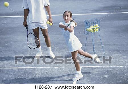 ball, swinging, girl, swing, tennis, sports View Large Photo Image Stock Photo - ball, swinging, girl, swing, tennis, sports. Fotosearch