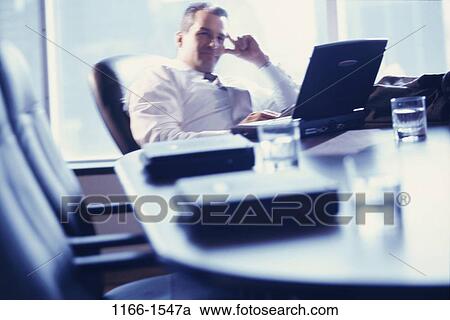 blur, business, Middle-aged, laptops, businessman View Large Photo Image Stock Image - blur, business, Middle-aged, laptops, businessman. Fotosearch