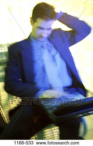Stock Image - blur, sitting, computer, laptop, motion, business. Fotosearch
