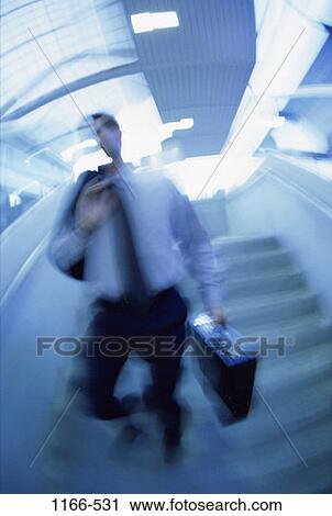 Stock Image - blur, steps, stairs, briefcase, motion, business. Fotosearch