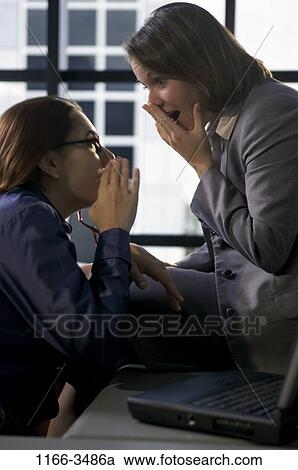 business, gossip, whispering, secrets, indoors, Caucasian, whisper View Large Photo Image Stock Image - business, gossip, whispering, secrets, indoors, Caucasian, whisper. Fotosearch