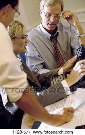 business, Middle-aged, teamwork, executives, meetings, planning, computers View Large Photo Image Stock Photo - business, Middle-aged, teamwork, executives, meetings, planning, computers. Fotosearch