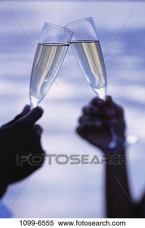 celebration, toasting, champagne, two, holding, alcoholic, alcohol View Large Photo Image Stock Photography - celebration, toasting, champagne, two, holding, alcoholic, alcohol. Fotosearch