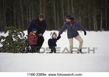Christmas, family, holiday, Christmas families View Large Photo Image Stock Image - Christmas, family, holiday, Christmas families. Fotosearch