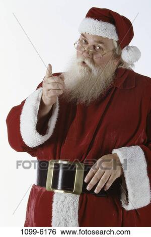 Christmas, pointing, point, indoors, holiday, Claus View Large Photo Image Stock Photograph - Christmas, pointing, point, indoors, holiday, Claus. Fotosearch