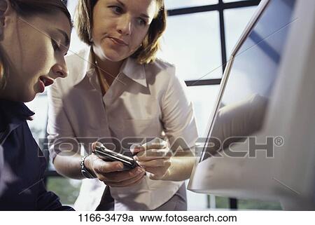 computer, business, using, indoors, Caucasian, businesswomen, use View Large Photo Image Stock Image - computer, business, using, indoors, Caucasian, businesswomen, use. Fotosearch