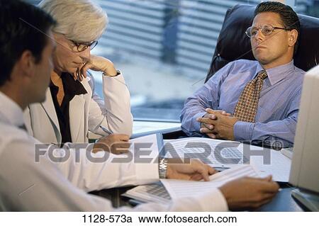 desk, charts, papers, business, Middle-aged, teamwork, contemplation View Large Photo Image Stock Image - desk, charts, papers, business, Middle-aged, teamwork, contemplation. Fotosearch