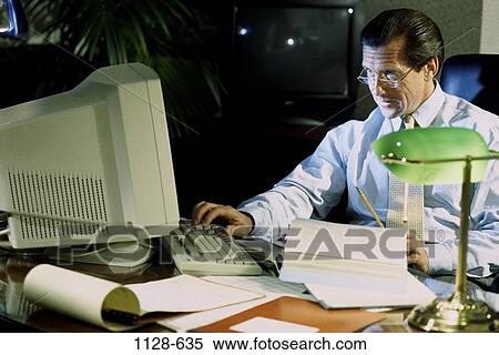 desk, night, eyeglasses, computer, typing, stress View Large Photo Image Stock Photography - desk, night, eyeglasses, computer, typing, stress. Fotosearch