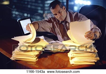 desk, paperwork, computer, laptop, individual, business View Large Photo Image Stock Image - desk, paperwork, computer, laptop, individual, business. Fotosearch