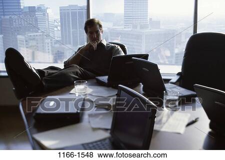 desk, silhouette, business, laptops, businessman View Large Photo Image Stock Photo - desk, silhouette, business, laptops, businessman. Fotosearch