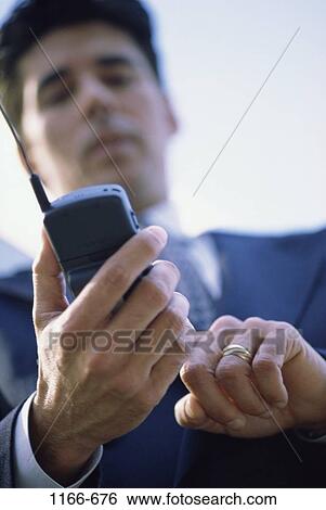 Stock Photograph - dial, dialing, telephone, phone, business, outdoors. Fotosearch