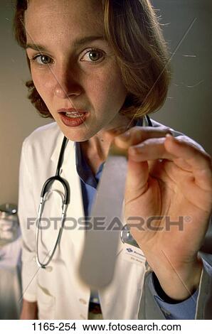 doctor, tongue, health, medical personnel, examinations, suppresser, Medical staff doctors View Large Photo Image Picture - doctor, tongue, health, medical personnel, examinations, suppresser, Medical staff doctors. Fotosearch