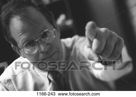 eyeglasses, individual, pointing, business, confrontation, point View Large Photo Image Stock Image - eyeglasses, individual, pointing, business, confrontation, point. Fotosearch
