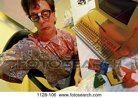 Stock Photograph - eyeglasses, isolation, busy, sitting, stress, business. Fotosearch