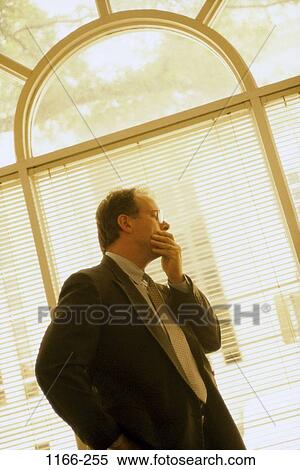 eyeglasses, window, business, Middle-aged, contemplation, serious View Large Photo Image Stock Photography - eyeglasses, window, business, Middle-aged, contemplation, serious. Fotosearch