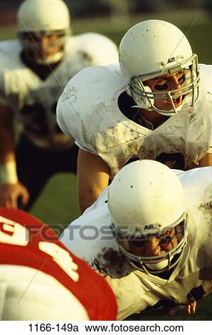 football, outdoors, competition, quarterback, helmets, team, uniforms View Large Photo Image Stock Image - football, outdoors, competition, quarterback, helmets, team, uniforms. Fotosearch