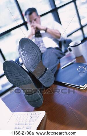 glass, desk, eyeglasses, individual, business, Middle-aged View Large Photo Image Stock Image - glass, desk, eyeglasses, individual, business, Middle-aged. Fotosearch