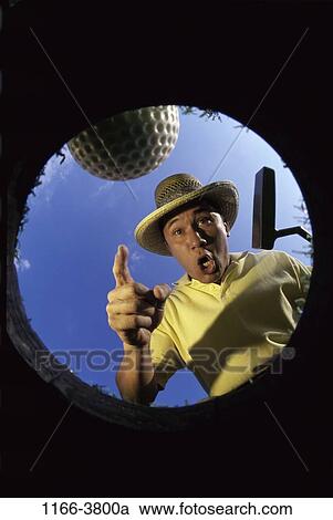golf, Asian, ball, round, anxious, pointing View Large Photo Image Stock Image - golf, Asian, ball, round, anxious, pointing. Fotosearch