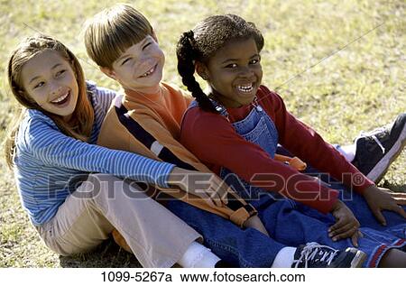 grass, multiethnic, people, smiling, playing, ground, sitting View Large Photo Image Stock Image - grass, multiethnic, people, smiling, playing, ground, sitting. Fotosearch