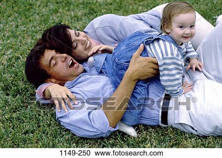 grass, people, playing, ground, toddler, playful, outdoors View Large Photo Image Stock Image - grass, people, playing, ground, toddler, playful, outdoors. Fotosearch