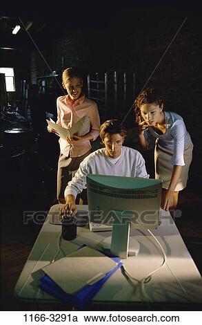 Stock Image - group, monitor, computer, watching, teamwork, using, work. Fotosearch