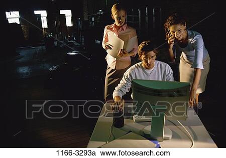 Stock Image - group, monitor, computer, watching, teamwork, using, work. Fotosearch