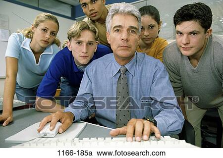 group, multiethnic, instructing, people, teacher, school, computer View Large Photo Image Stock Image - group, multiethnic, instructing, people, teacher, school, computer. Fotosearch