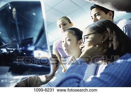 Stock Image - group, multiethnic, people, computer, education, class. Fotosearch