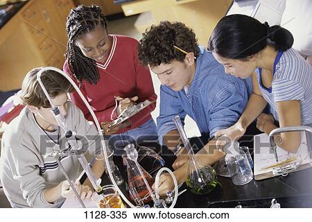 Stock Photography - group, multiethnic, people, school, testing, teamwork, education. Fotosearch