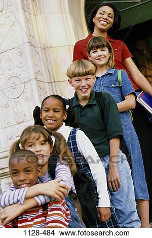 Picture - group, multiethnic, people, teacher, school, outdoors, diversity. Fotosearch