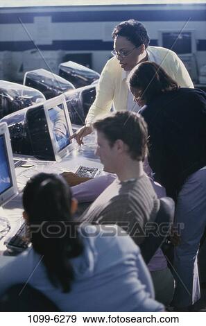 group, multiethnic, people, teacher, classroom, computers, education View Large Photo Image Stock Photo - group, multiethnic, people, teacher, classroom, computers, education. Fotosearch