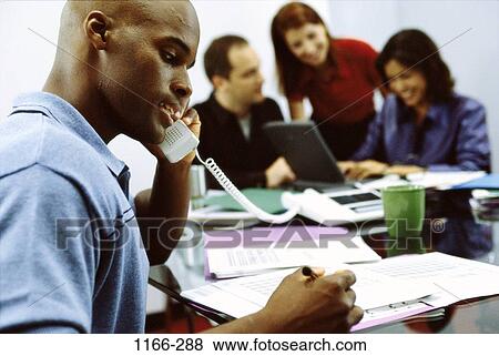 group, multiethnic, telephone, computer, laptop, phone, business View Large Photo Image Stock Photo - group, multiethnic, telephone, computer, laptop, phone, business. Fotosearch