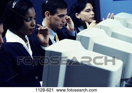 Stock Image - group, multiethnic, women, desk, listening, business. Fotosearch