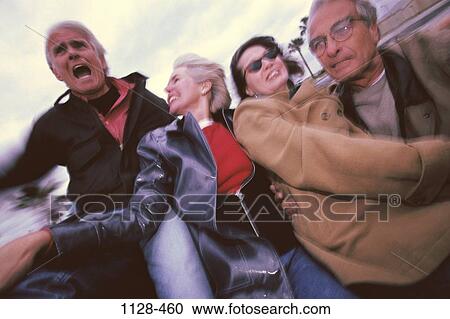 Stock Image - group, people, senior, convertible, riding, outdoors, adventurous. Fotosearch