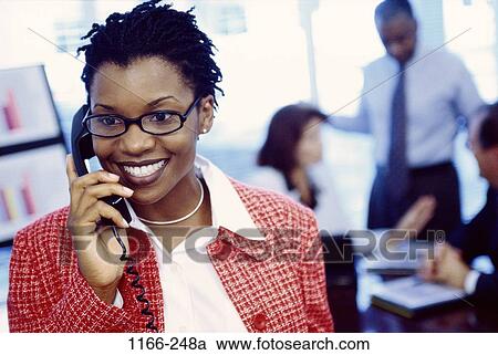 groups, smiling, telephone, eyeglasses, phone, confident, business View Large Photo Image Stock Image - groups, smiling, telephone, eyeglasses, phone, confident, business. Fotosearch