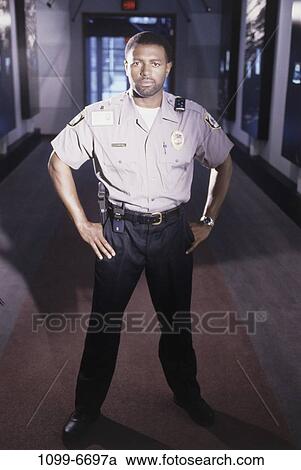 guard, security, indoors, occupation, African-American View Large Photo Image Stock Image - guard, security, indoors, occupation, African-American. Fotosearch