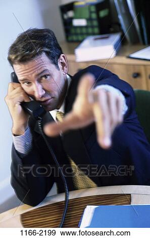 hand, desk, telephone, talking, listening, phone View Large Photo Image Stock Photo - hand, desk, telephone, talking, listening, phone. Fotosearch