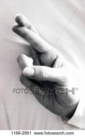 Stock Image - hand, hoping, body parts, crossed, fingers, lying, hope. Fotosearch