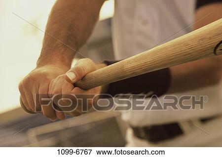 Stock Photo - hands, playing, bat, baseball, holding, sports, body parts. Fotosearch