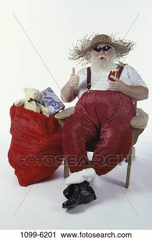 hat, Christmas, drinking, sunglasses, relaxing, bag, alcoholic View Large Photo Image Stock Image - hat, Christmas, drinking, sunglasses, relaxing, bag, alcoholic. Fotosearch