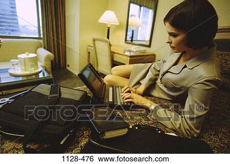 hotel, desk, woman, table, lamp, window, couch View Large Photo Image Stock Photograph - hotel, desk, woman, table, lamp, window, couch. Fotosearch