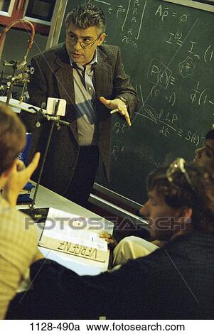 instructing, people, teacher, school, chalk, classroom View Large Photo Image Stock Image - instructing, people, teacher, school, chalk, classroom. Fotosearch