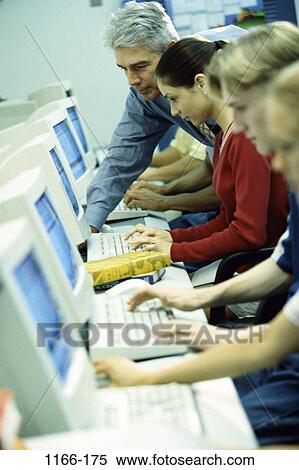 instructing, people, teacher, school, typing, classroom, computers View Large Photo Image Stock Photography - instructing, people, teacher, school, typing, classroom, computers. Fotosearch