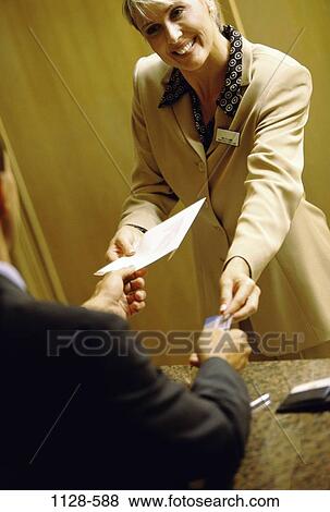 key, hotel, woman, business, hospitality, paying View Large Photo Image Stock Photo - key, hotel, woman, business, hospitality, paying. Fotosearch