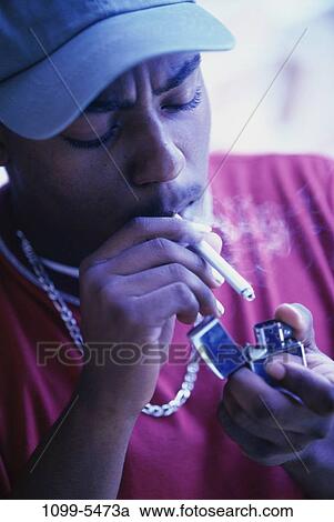 light, hat, smoke, cigarette, smoking View Large Photo Image Stock Image - light, hat, smoke, cigarette, smoking. Fotosearch