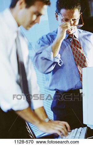 meeting, computer, typing, business, teamwork, contemplation, executives View Large Photo Image Stock Image - meeting, computer, typing, business, teamwork, contemplation, executives. Fotosearch