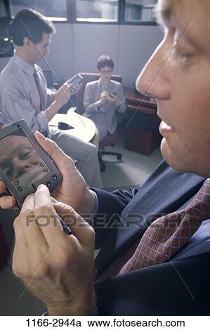 Stock Image - meeting, group, business, Middle-aged, planning, using, plan. Fotosearch
