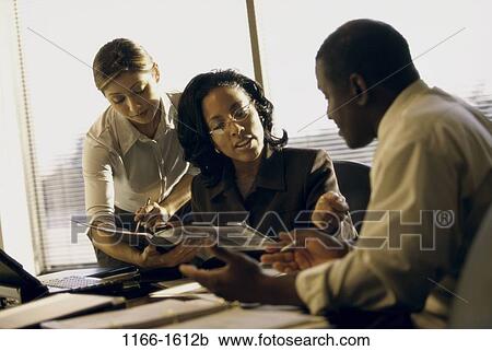 meeting, group, conference, business, businesspeople, Businesspeople conferring View Large Photo Image Stock Image - meeting, group, conference, business, businesspeople, Businesspeople conferring. Fotosearch